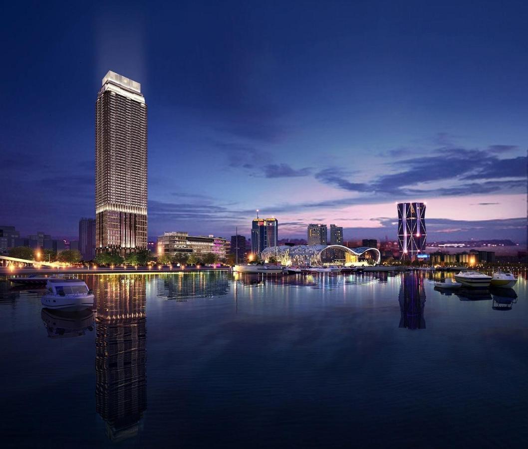 Intercontinental Kaohsiung By Ihg Hotel ภายนอก รูปภาพ The complex at night